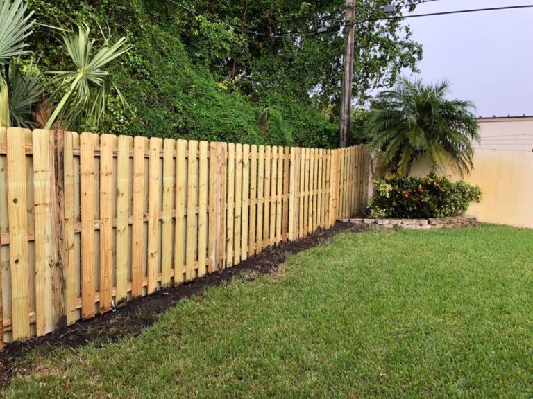 best fence installers in miami doing a wood fence installation