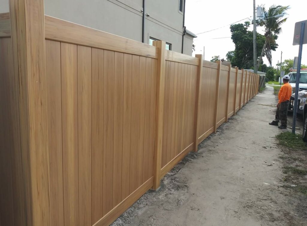 pvc vinyl fence install in brown color